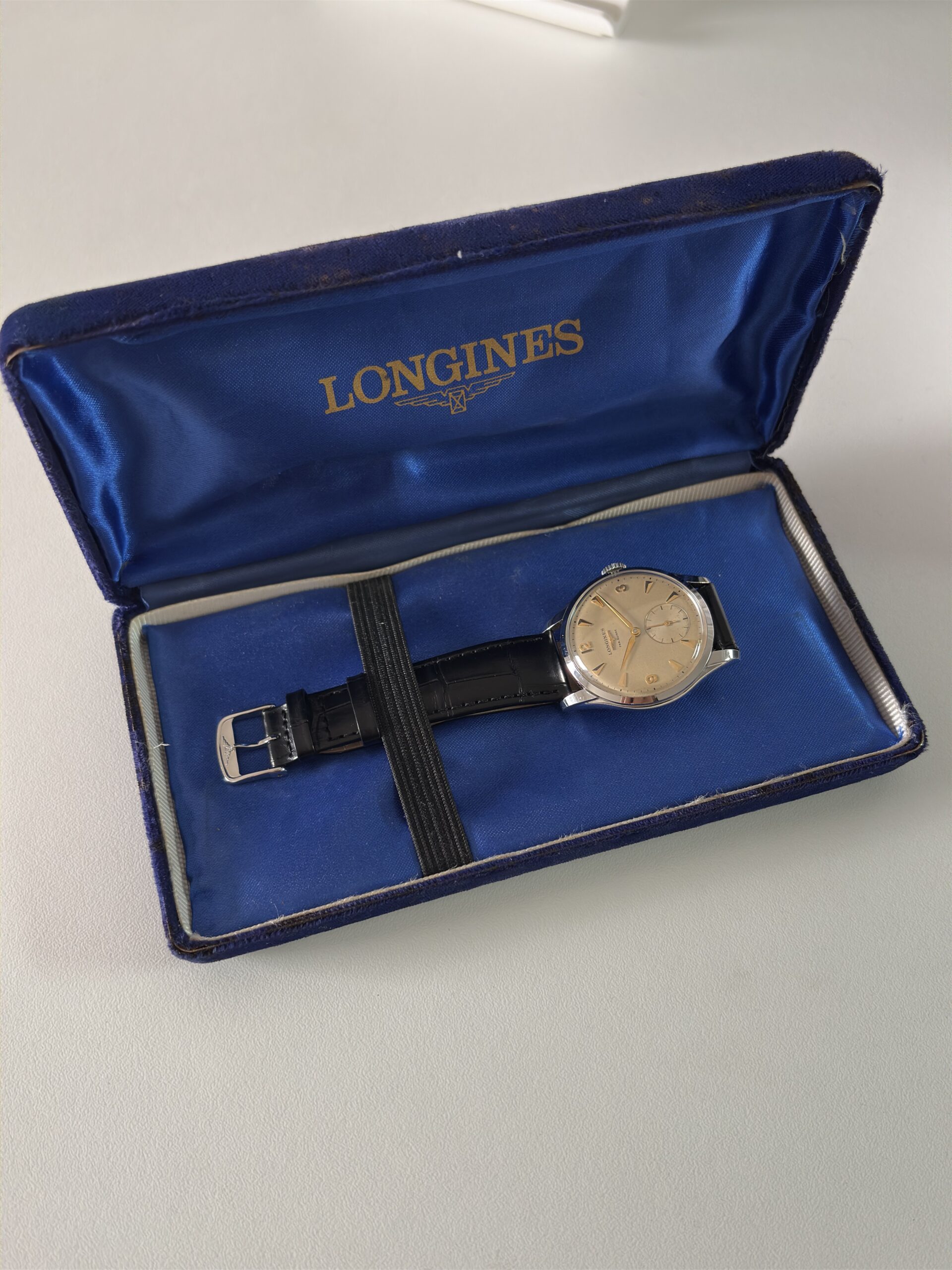 longines pre-flagship 7033-3 et son écrin d'origine bleu